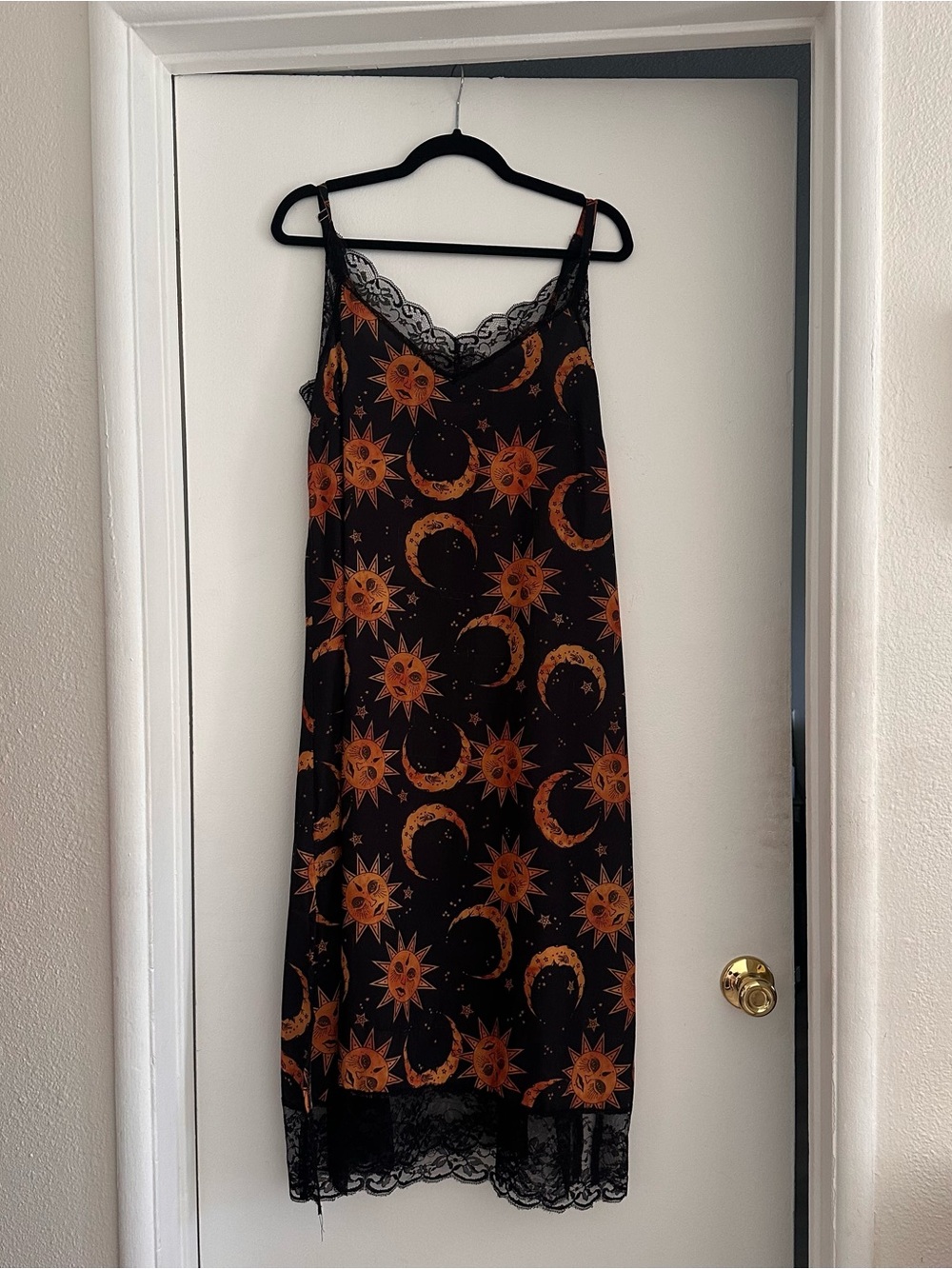 Cosmic Drifters celestial dress in Black and Orange